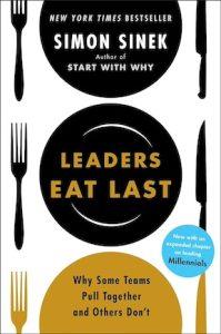 Book cover of Leaders Eat Last, showing aerial view of plate setting graphic